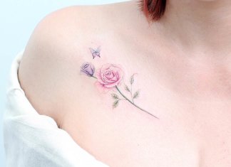 Beautiful tattoo on the collarbone of a girl