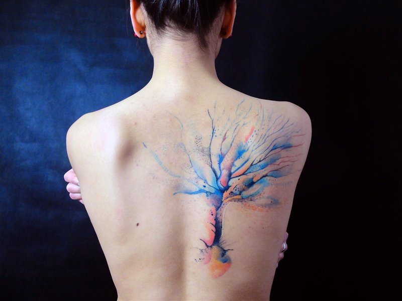 Watercolor tattoo tree on the back