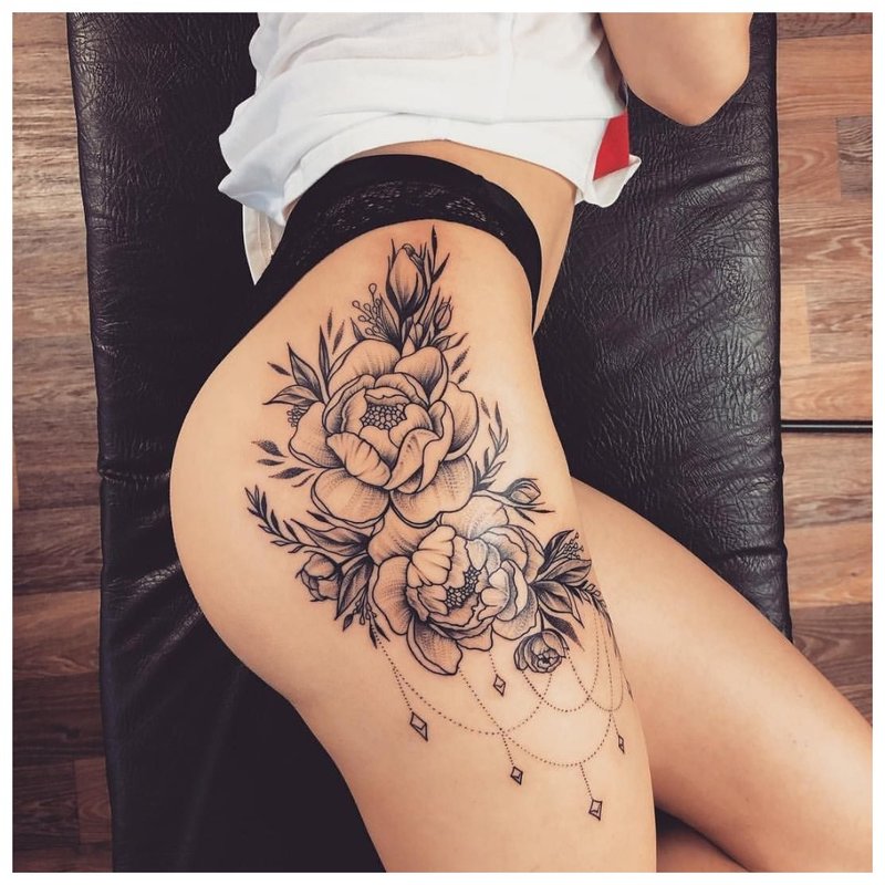 Gentle hip tattoo on the side