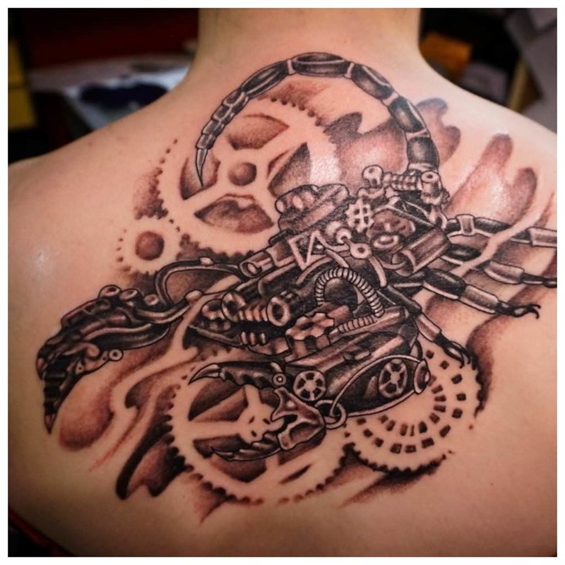 Steampunk tattoo on the back