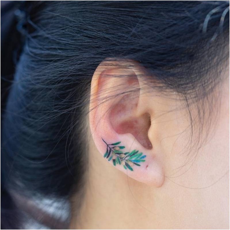 Bright flower on ear