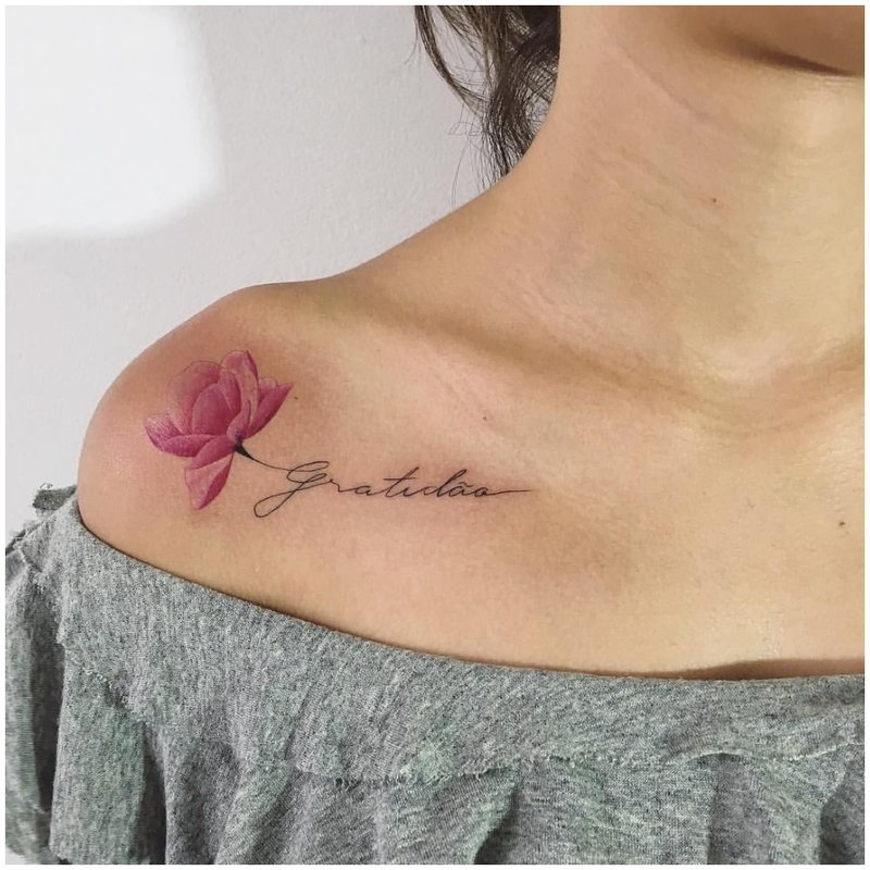 Rose with an inscription under the collarbone