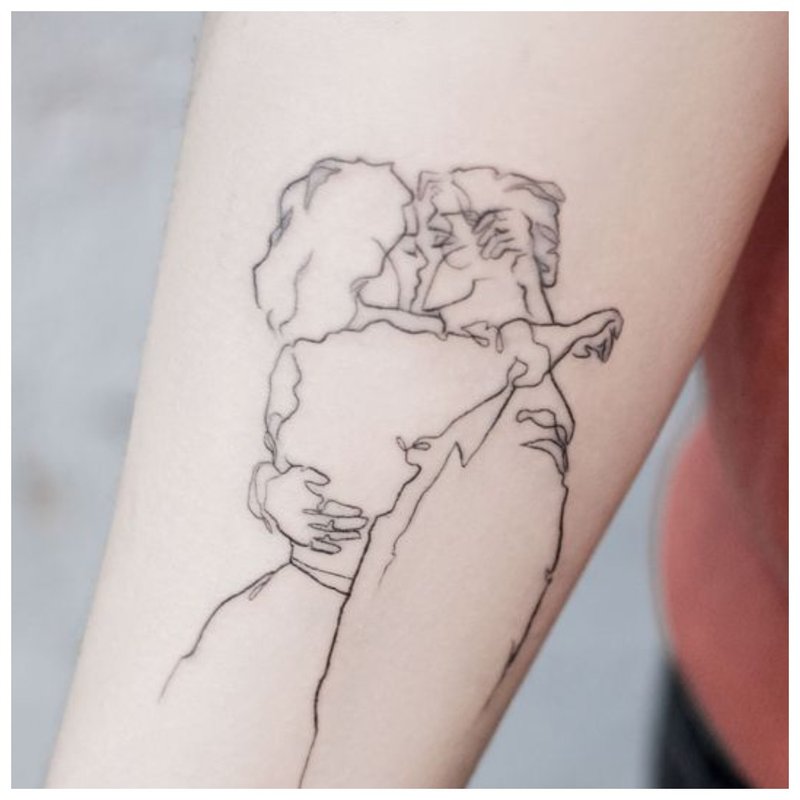 Loving couple tattoo