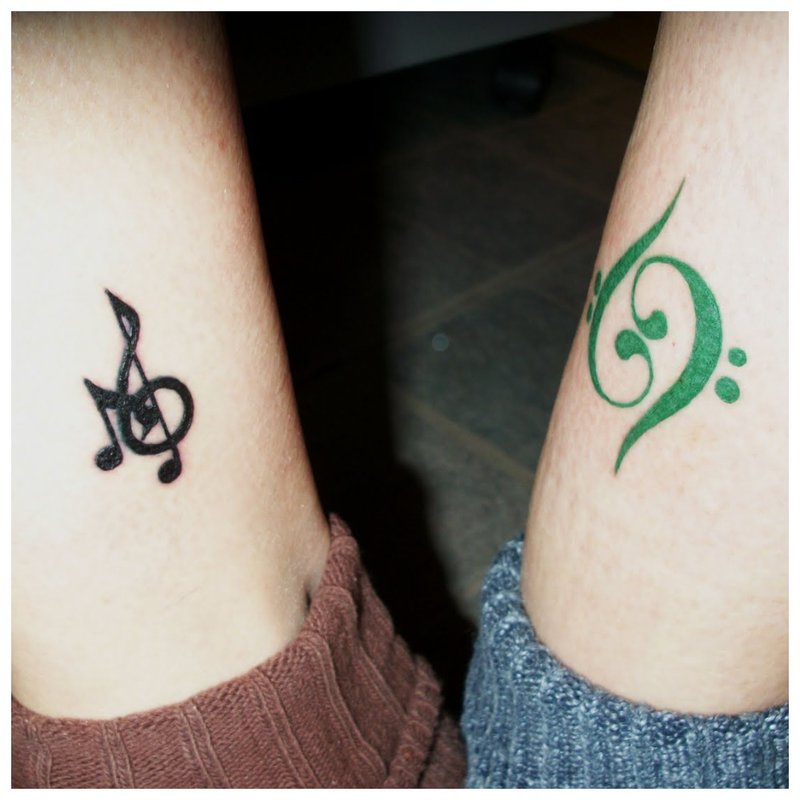 Musical sign paired tattoo