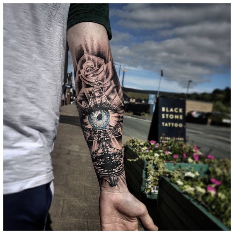 Mysterious guy arm tattoo