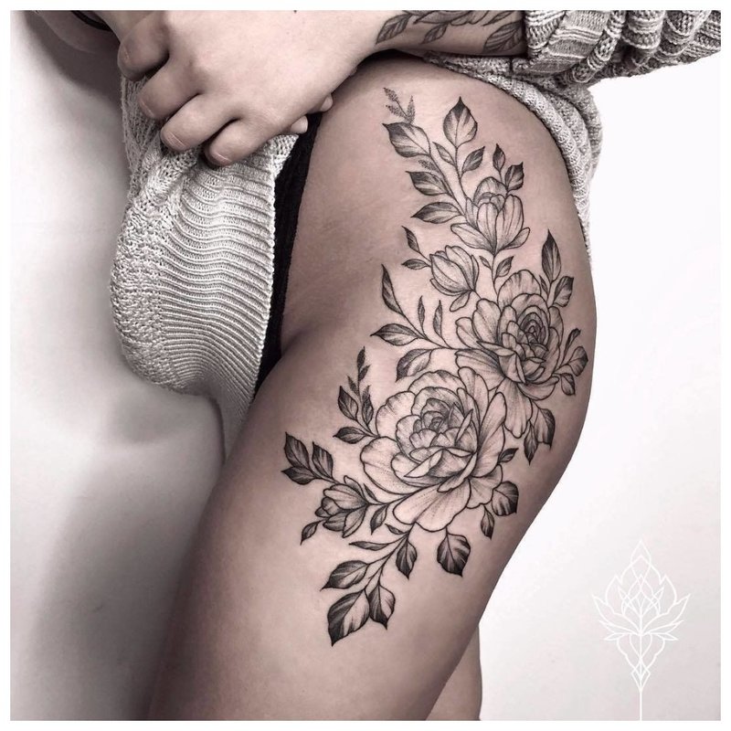 Floral theme for hip tattoo