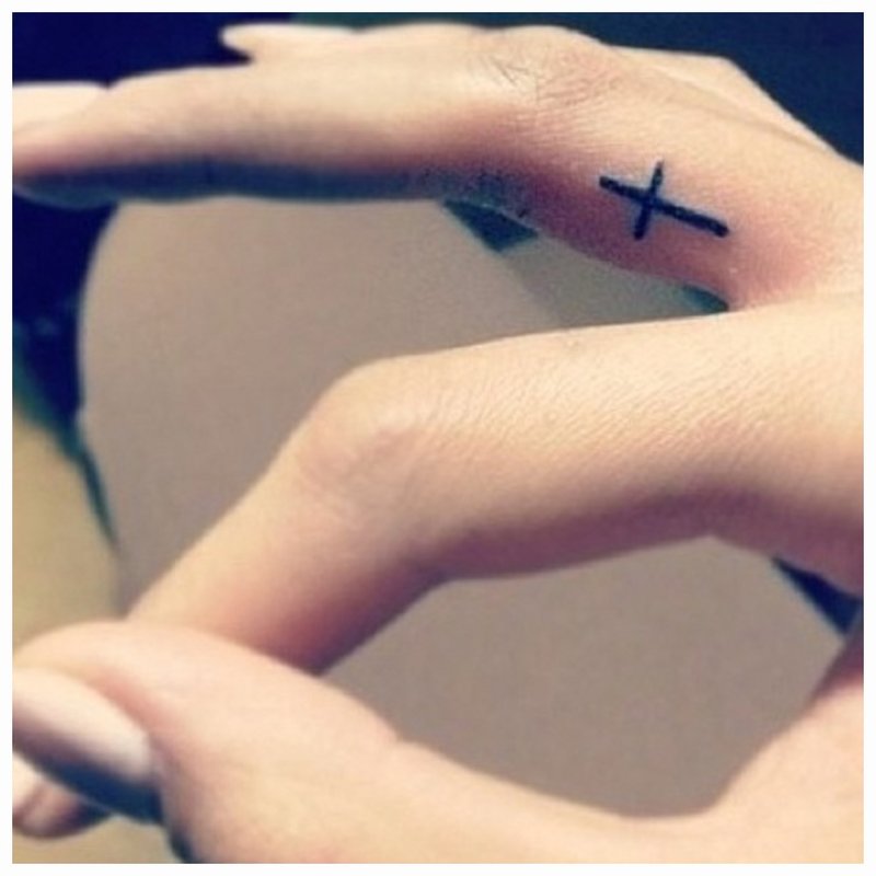 Cross tattoo