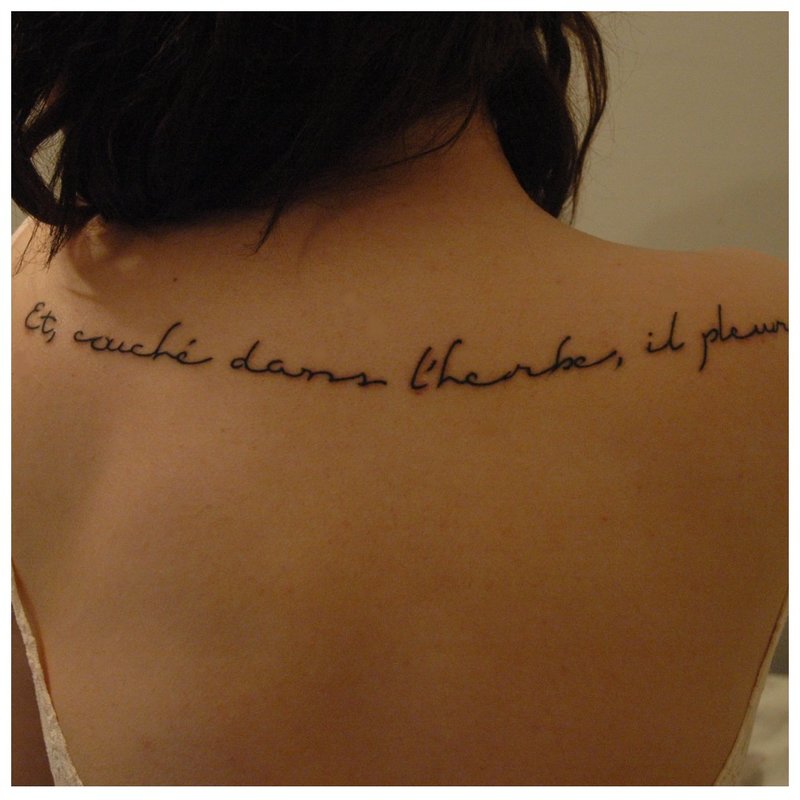 French inscription tattoo