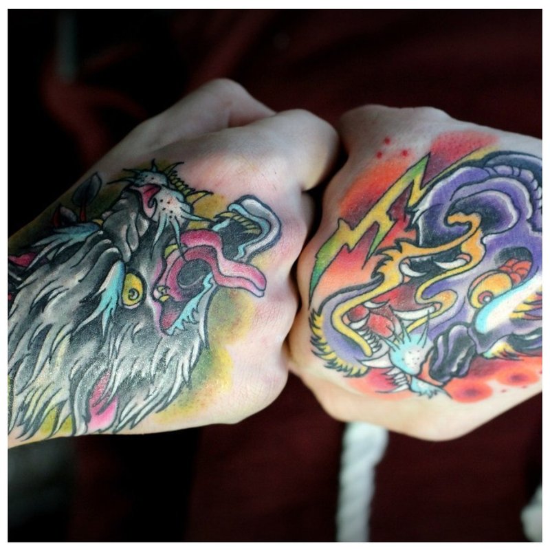 Colored tattoos on fists