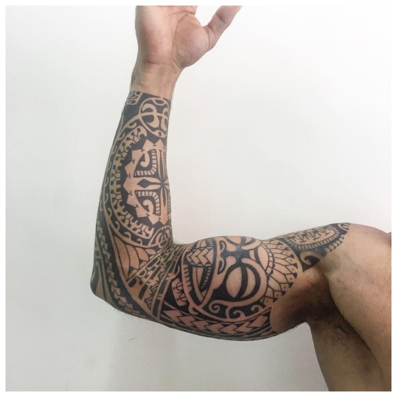 Ethnic tattoo on forearm