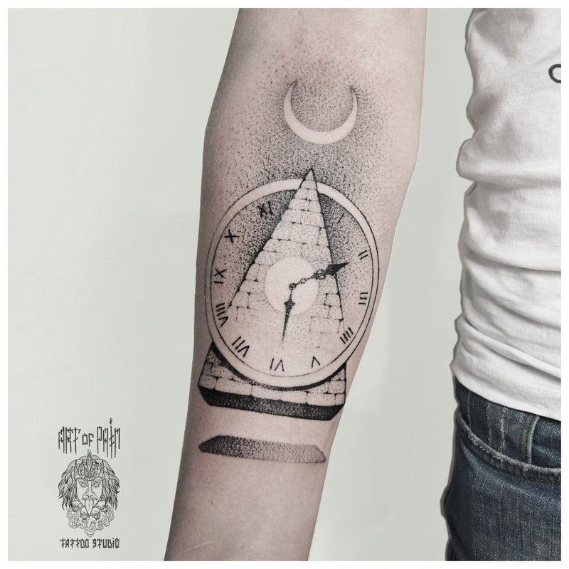 Symbolic tattoo on the forearm of a man