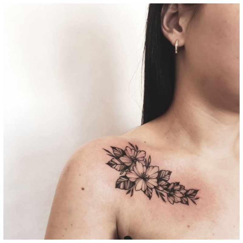 Large clavicle tattoo