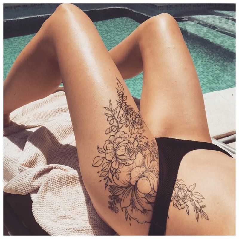 Beautiful tattoo on the hip and thigh