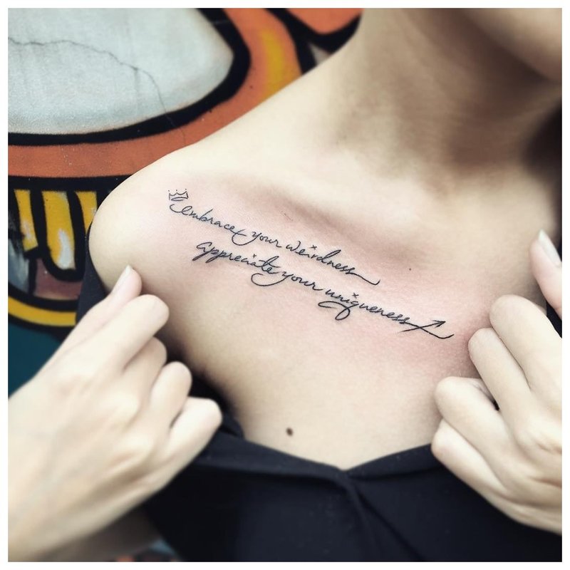 Tattoo inscription on the clavicle