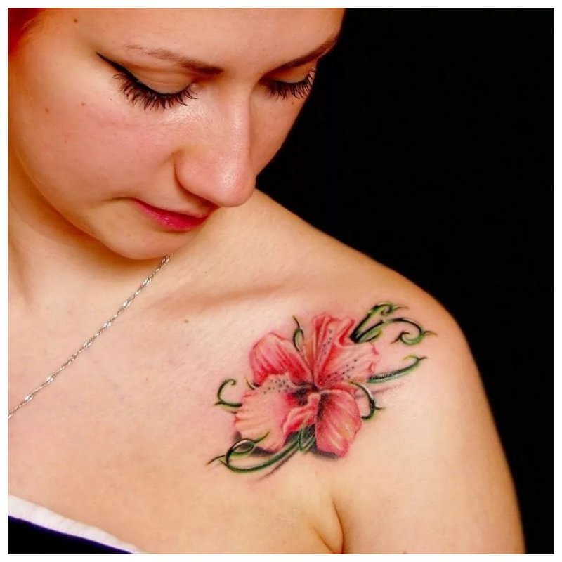 Beautiful flower - clavicle tattoo