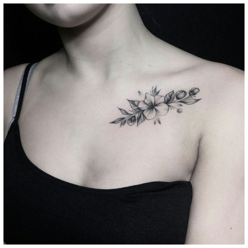 Clavicle tattoo in black