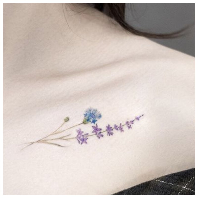 Beautiful flower - clavicle tattoo