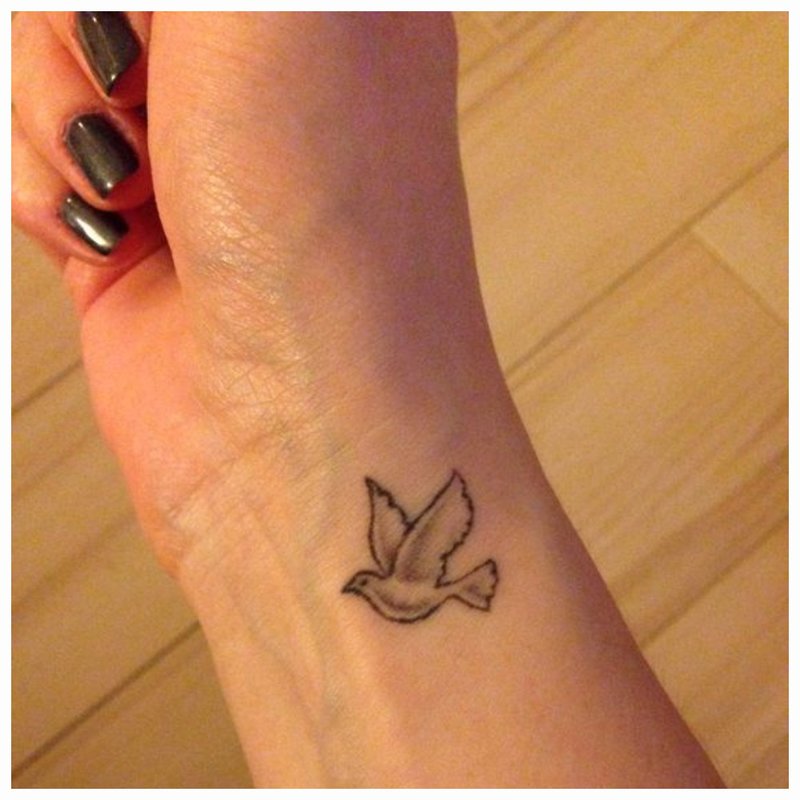 Bird on the wrist tattoo