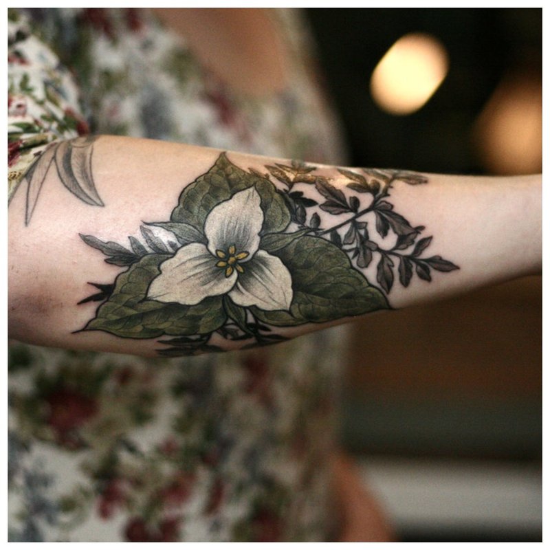 Full arm flower tattoo