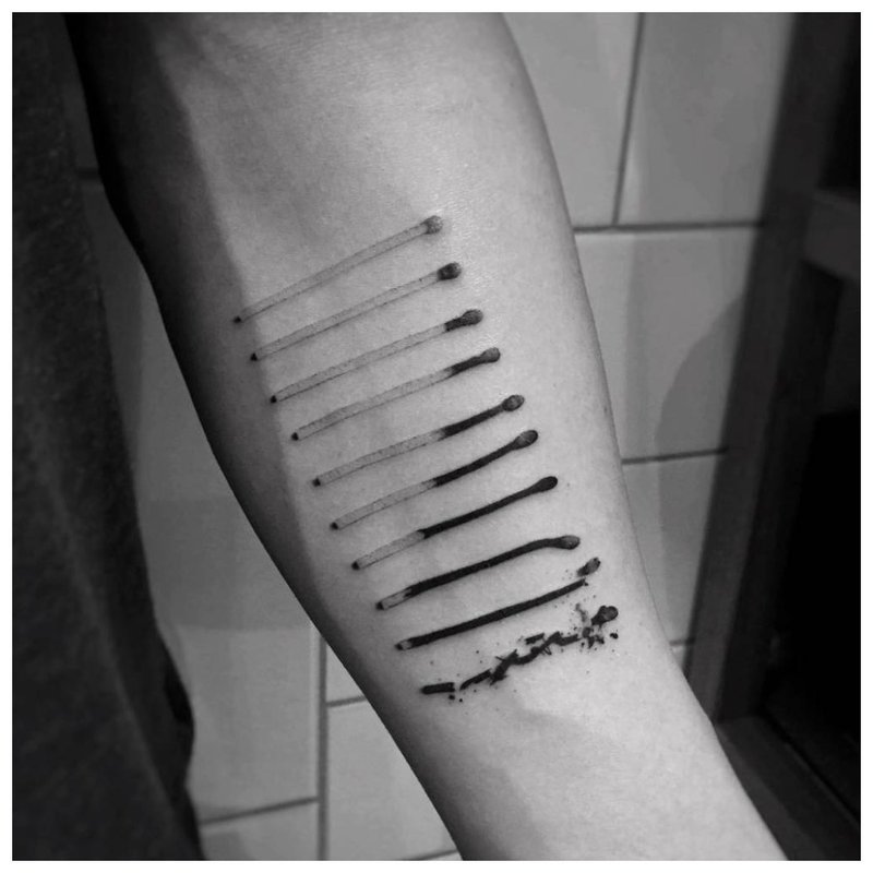 Original forearm tattoo - burnt matches