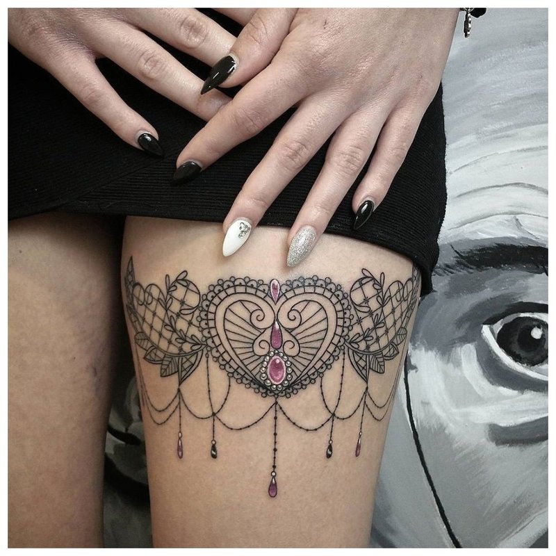 Oriental theme tattoo on the girl’s leg