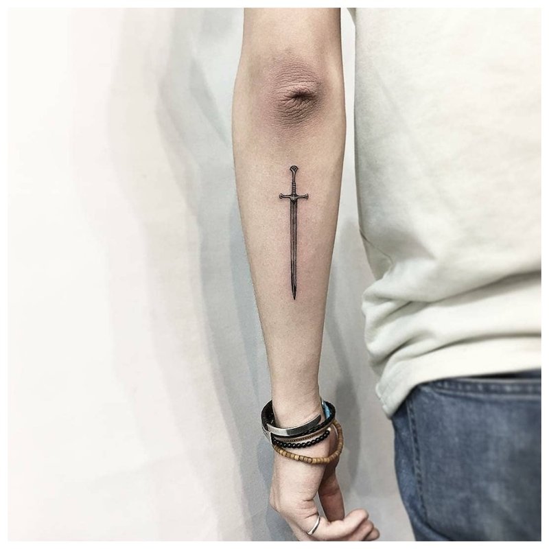 Minimalist forearm tattoo