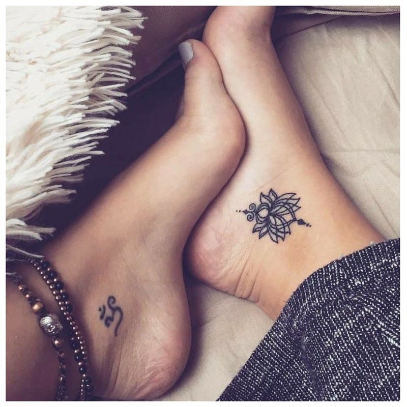 Paired ankle tattoos