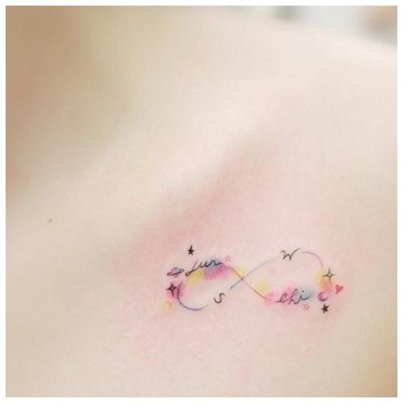 Gentle tattoo under the collarbone