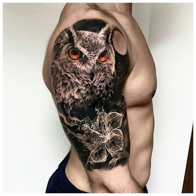 Owl tattoo on the shoulder