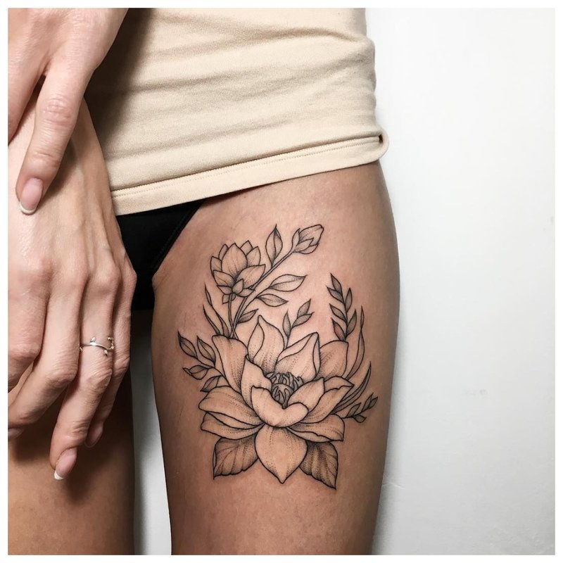 Floral theme for a thigh tattoo