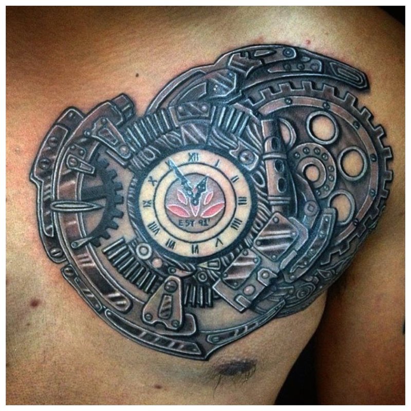 Steampunk tattoo with a clock