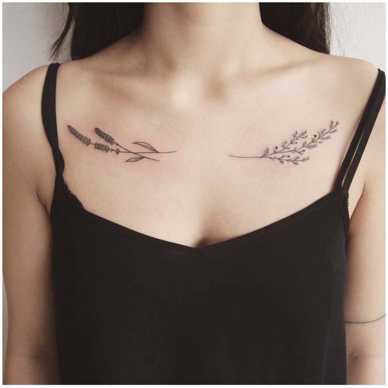 Symmetrical clavicle tattoos