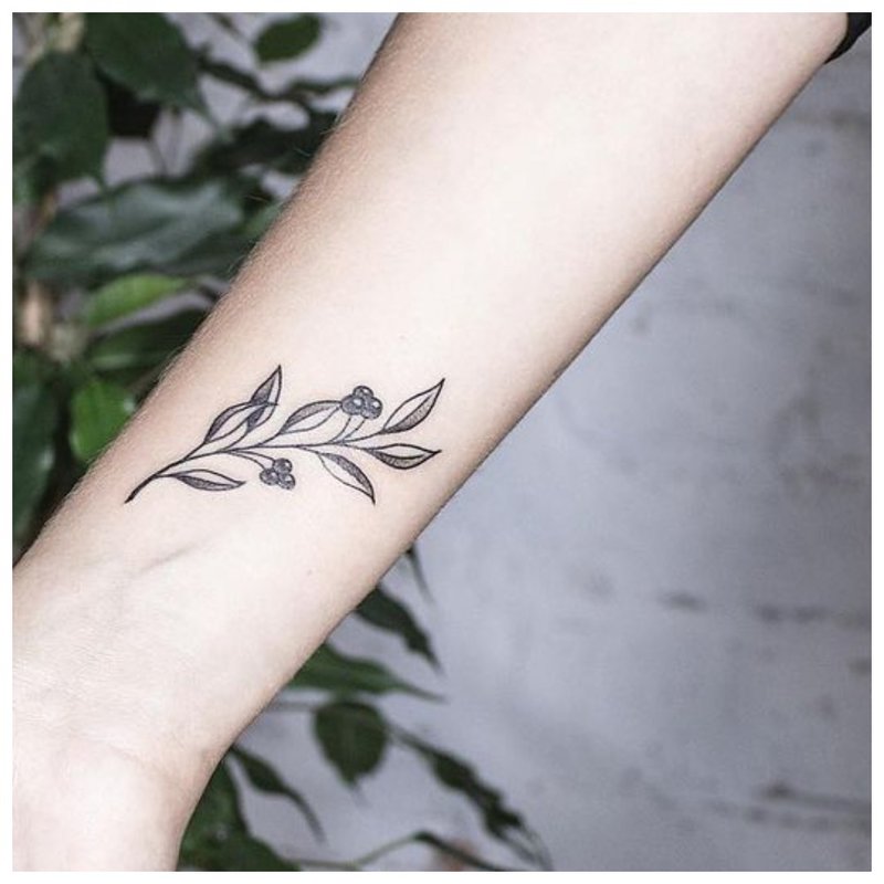 Flower tattoo on a girl's hand