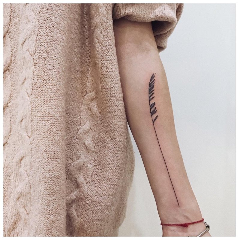 Minimalistic tattoo along the entire arm