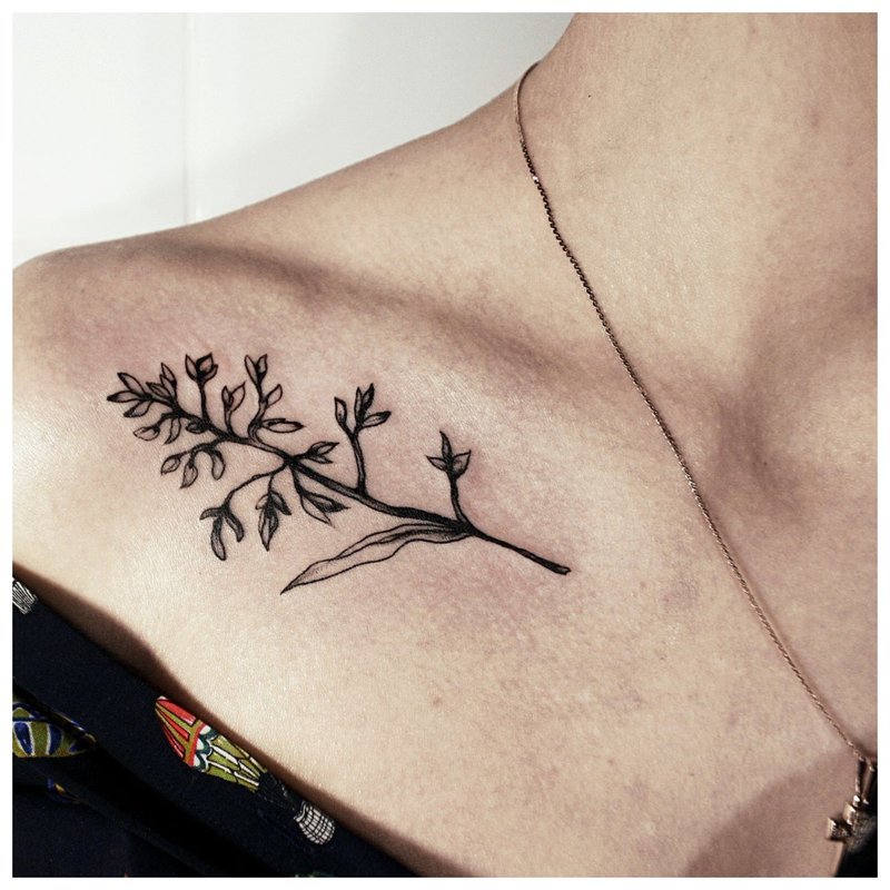 Twig tattoo in black