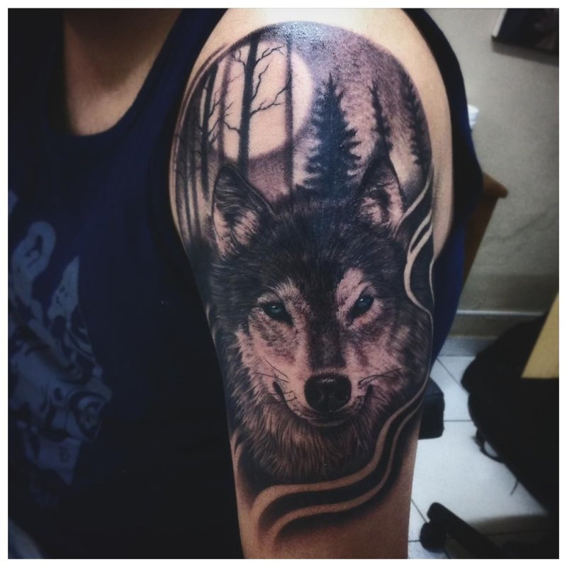 Severe Wolf - a man’s shoulder tattoo