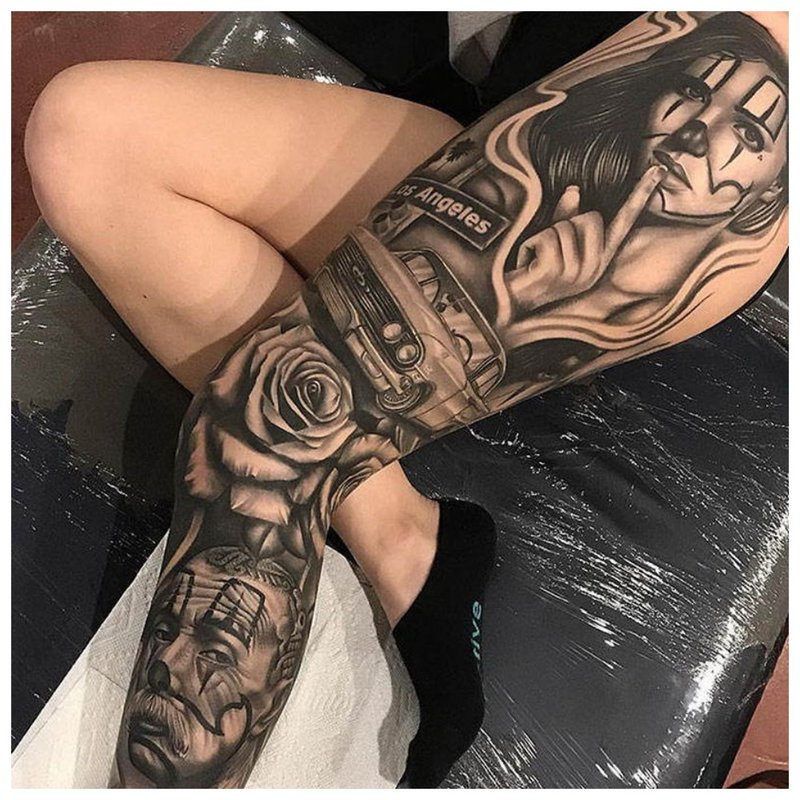 Dark tattoo on the whole leg