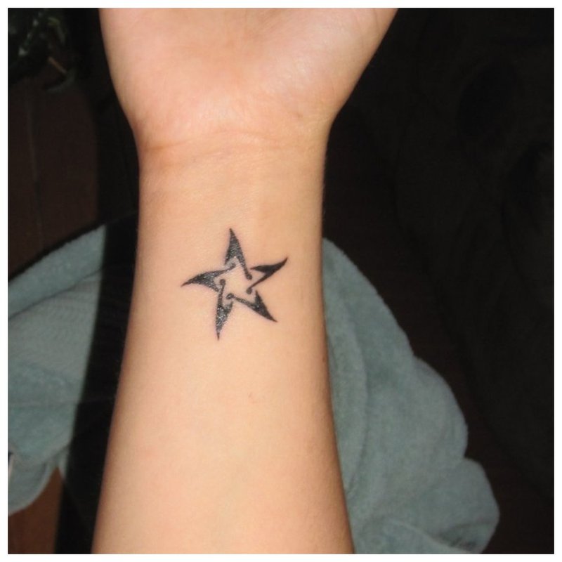 Star - wrist tattoo