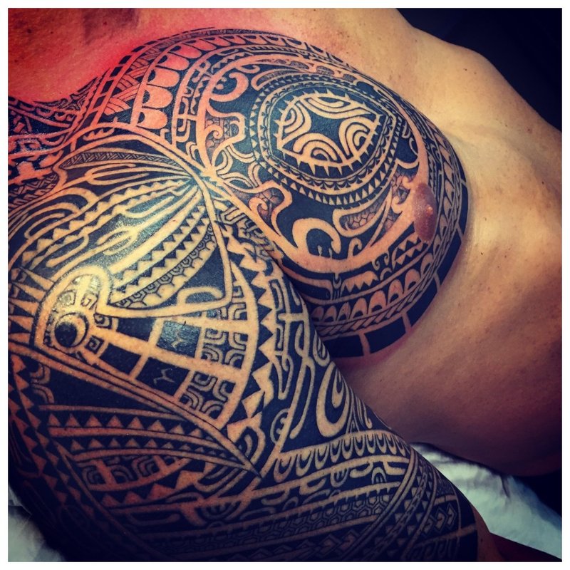 Ethnic shoulder tattoo