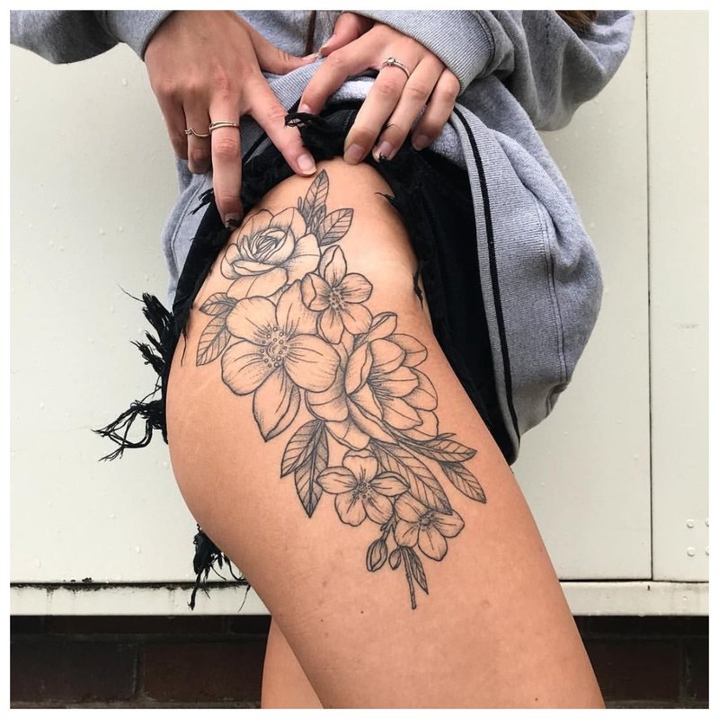 Floral theme for hip tattoo