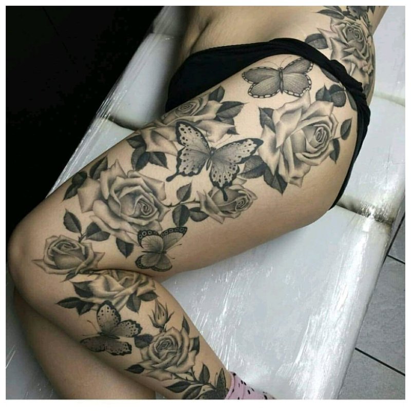 Tattoo on the whole leg and side