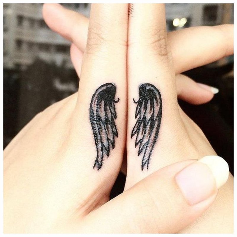 Angel wings tattoo