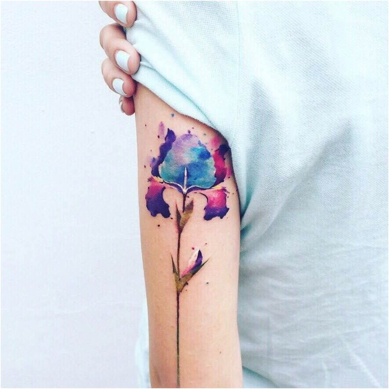 Watercolor tattoo with flower