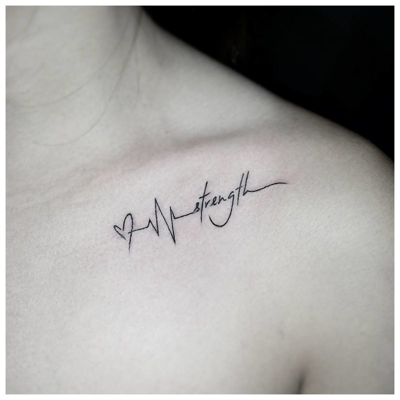 Unusual tattoo inscription under the collarbone