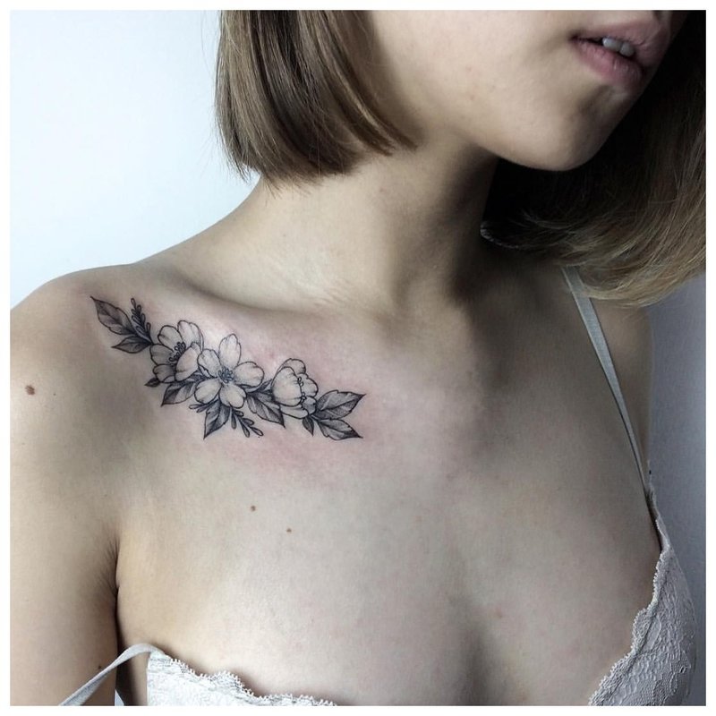 Girl's collarbone tattoo