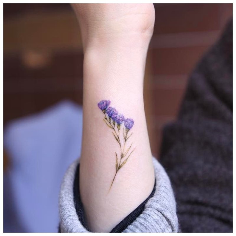 Floral wrist tattoo