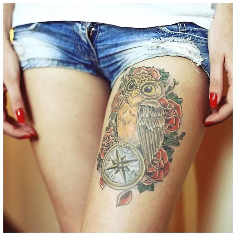 Bright owl tattoo on hip