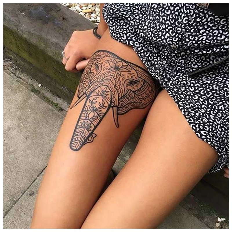 Girl elephant tattoo