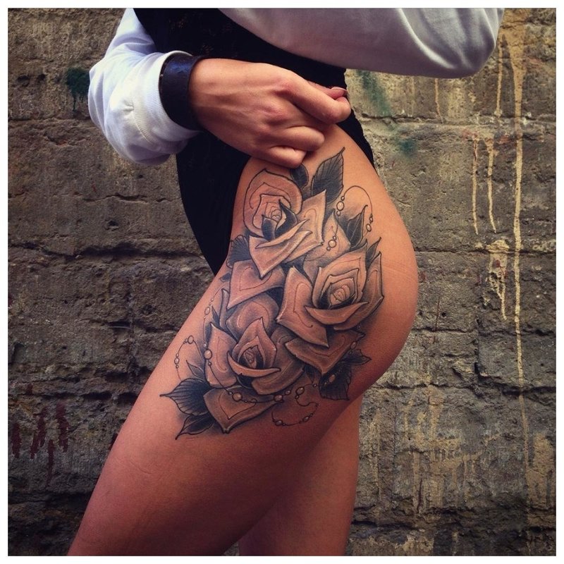 Beautiful girl hip tattoo