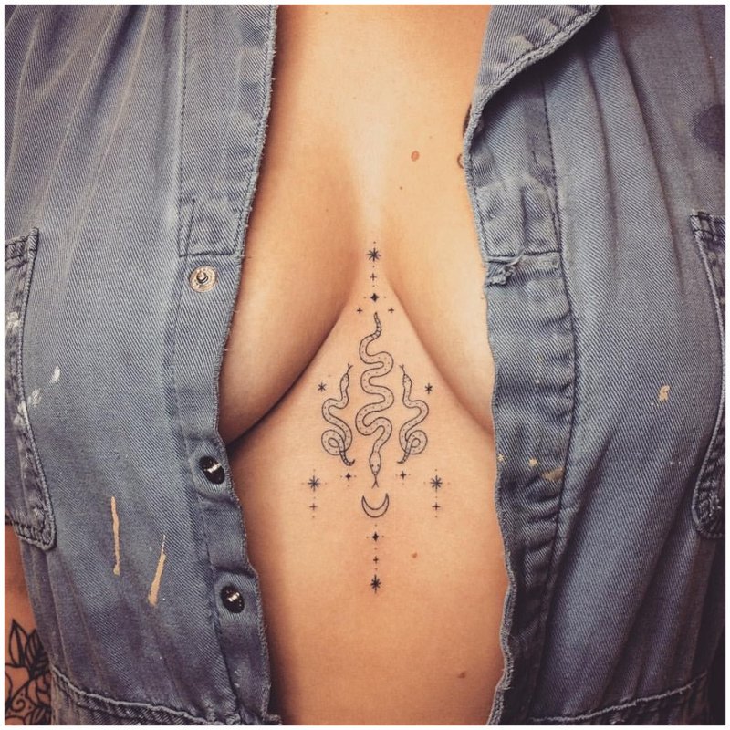 Tattoo between breasts